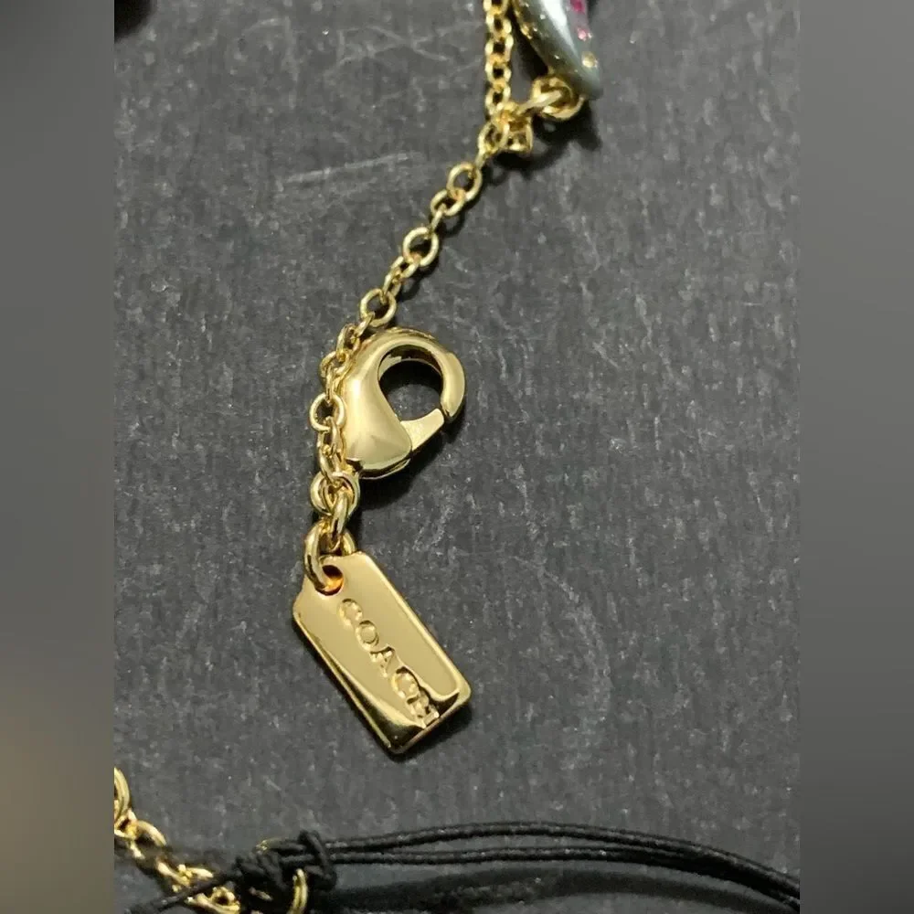 NEW COACH CHARM BRACELET
